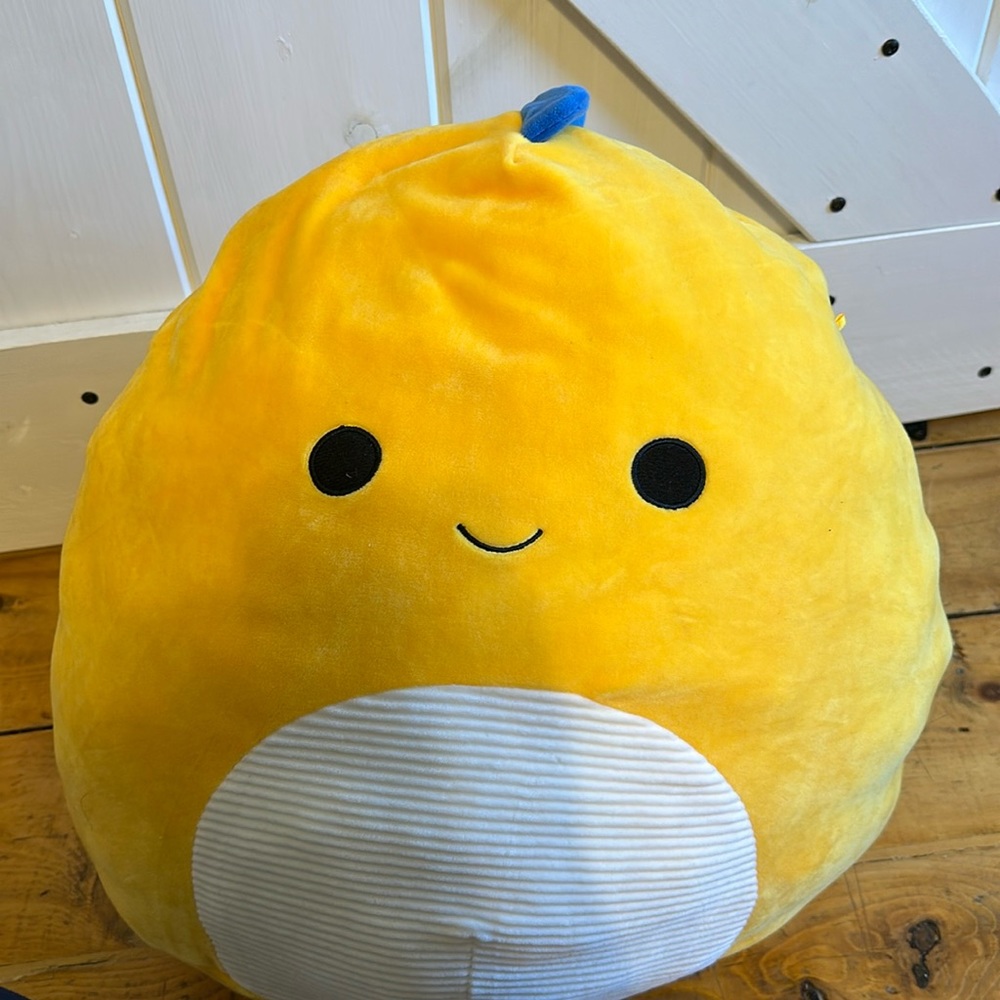 yellow dinosaur squishmallow “Hal”